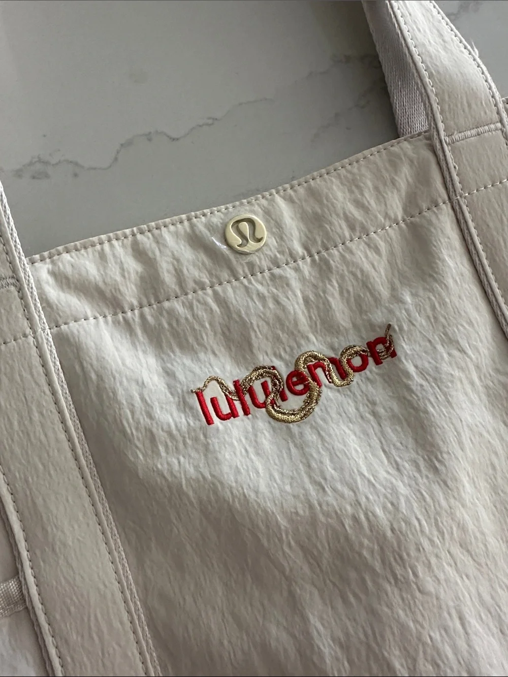 Lululemon Lunar New Year Daily Multi Pocket Tote Bag 20L in light ivory&red NWOT